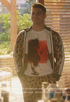 Vivek’s camo jacket and graffiti tee on Grown-ish