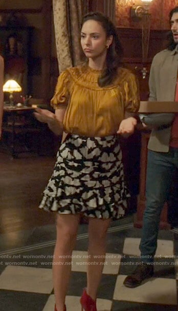 Zari’s yellow blouse and printed mini skirt on Legends of Tomorrow