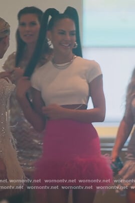 Amanza’s pink feather trim mini skirt on Selling Sunset