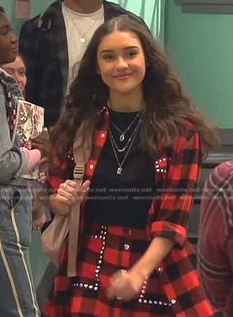 Cami’s red check studded shirt and mini skirt on Ravens Home