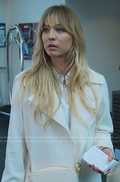 Cassie’s white trench coat on The Flight Attendant