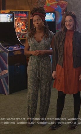 Denise’s green floral print jumpsuit on Home Economics