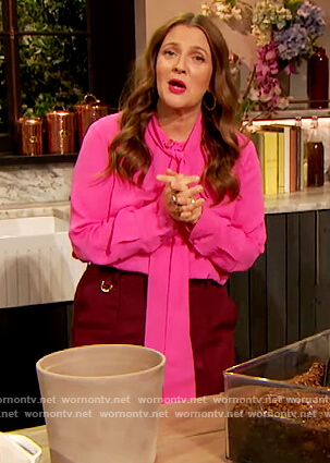 Drew’s pink tie neck blouse and pants on The Drew Barrymore Show