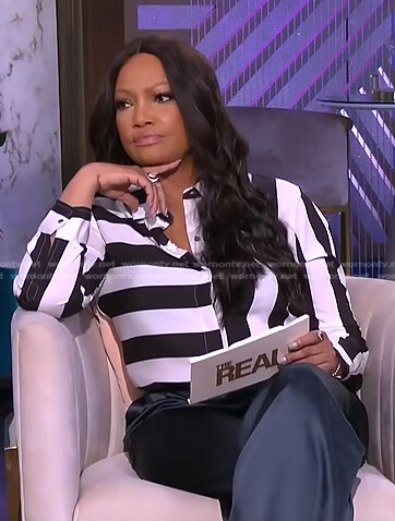 Garcelle’s black and white mixed stripe blouse on The Real
