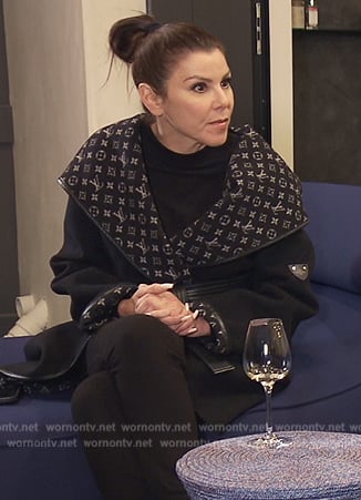 Heather’s black Louis Vuiton logo coat on The Real Housewives of Orange County