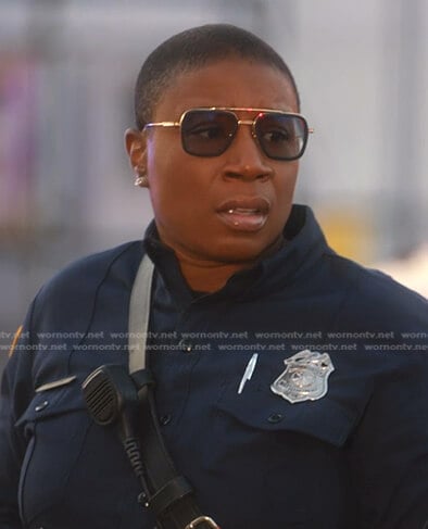 Hen’s black and gold frame sunglasses on 9-1-1