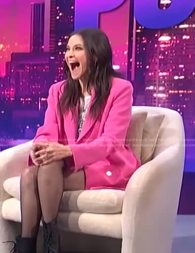 Jackie Tohn’s pink blazer and shorts on E! News Nightly Pop