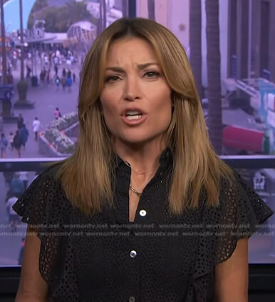 Kit’s black flutter sleeve eyelet top on Access Hollywood