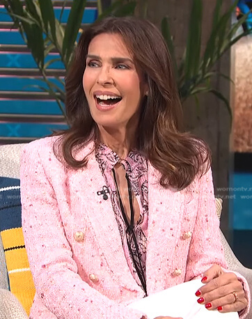 Kristian Alfonso’s pink tie neck blouse and tweed blazer on E! News Daily Pop