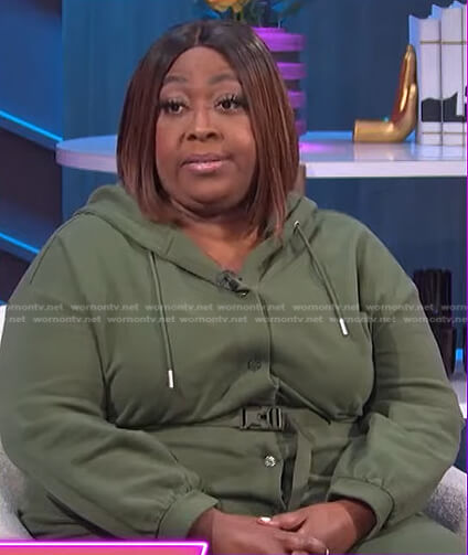 Loni’s green belted jumpsuit on E! News Nightly Pop