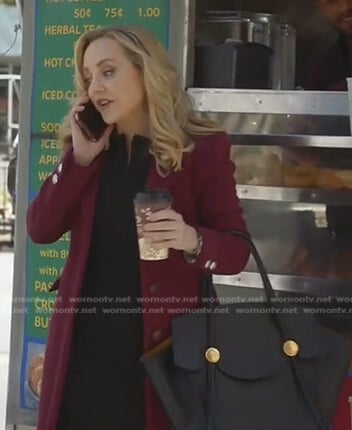Marissa’s black leather tote bag on Bull