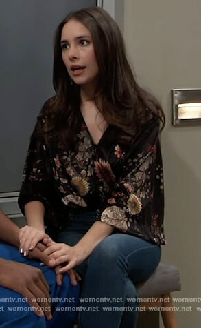 Molly’s black floral print v-neck top on General Hospital
