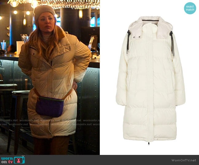 Moncler Erysimum Down Coat worn by Cassie Bowden (Kaley Cuoco) on The Flight Attendant