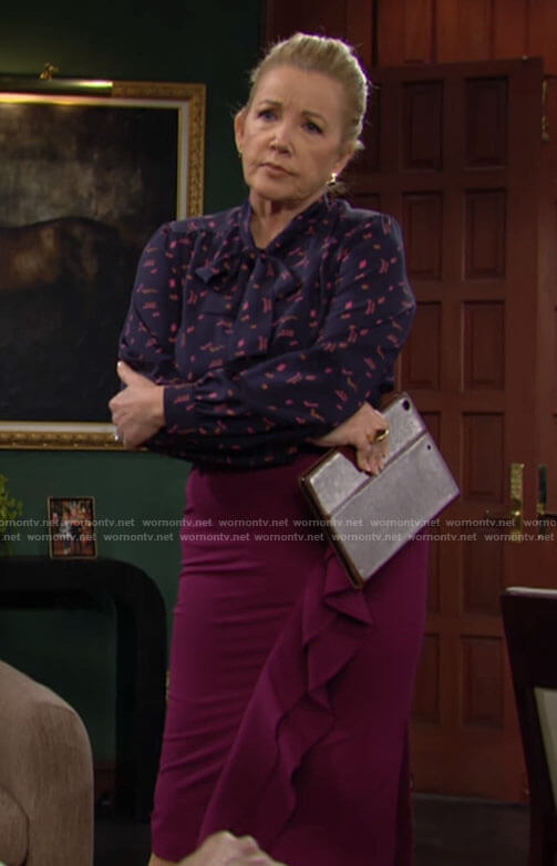 Nikki’s navy printed tie neck blouse on The Young and the Restless