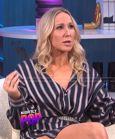 Nikki Glaser’s navy striped shirtdress on E! News Nightly Pop