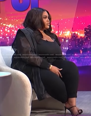 Nina’s black organza jacket and track pants on E! News Nightly Pop