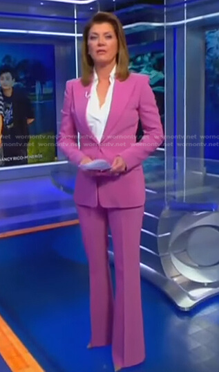 Norah’s pink blazer and flare pants on CBS Evening News