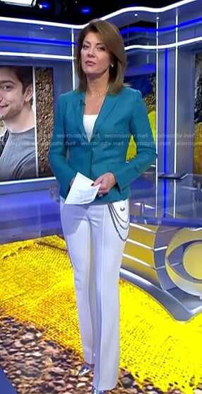 Norah’s white chain detail pants on CBS Evening News