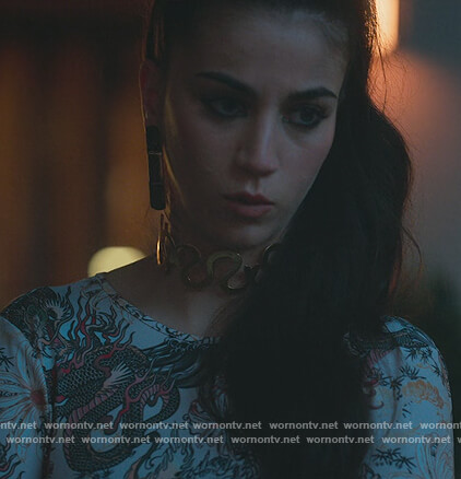 Rebe’s dragon print mesh top on Elite