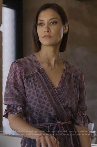 Ren’s purple printed wrap dress on Big Sky