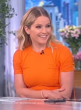 Sara’s orange ruched mini dress on The View