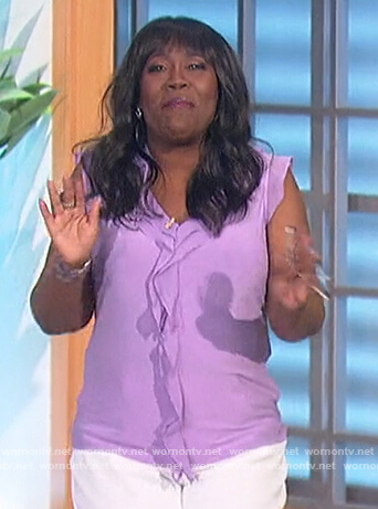 Sheryl’s lavender ruffle front top on The Talk