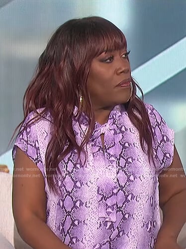 Sheryl’s purple snake skin print top on The Talk