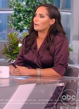 Stephanie Grisham’s purple satin wrap dress on The View