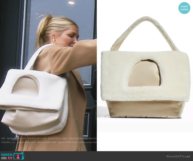 Studio Amelia Monument Cutout Shearling Shoulder Bag worn by Dr. Jen Armstrong on The Real Housewives of Orange County