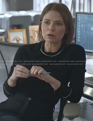 Taylor’s black contrast trim sweater on Bull