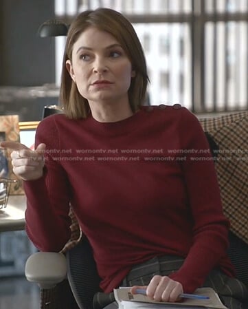 Taylor’s burgundy button shoulder sweater on Bull