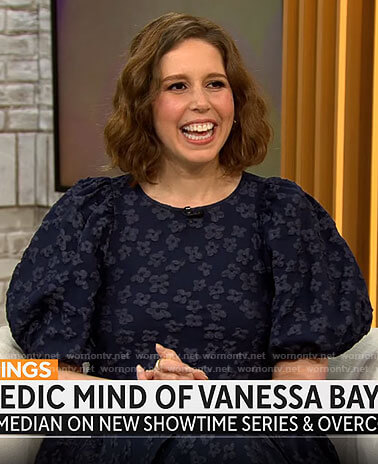Vanessa Bayer’s navy floral puff sleeve top and pants set on CBS Mornings