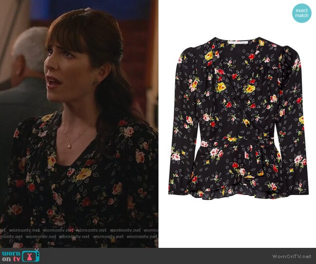 Veronica Beard Kiona floral-print silk crepe de chine wrap blouse worn by Marina (Karla Souza) on Home Economics