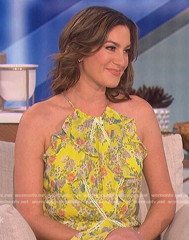 Elizabeth Wagmeister’s yellow floral ruffle dress on The Talk