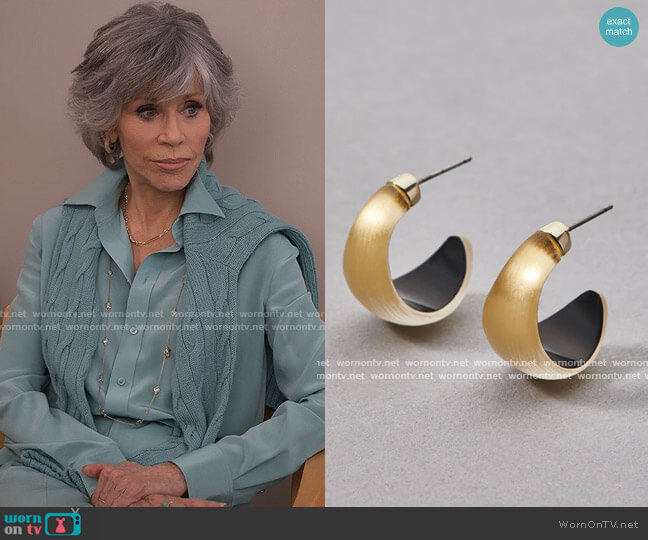 Alexis Bittar Lucite Huggie Hoop Earrings in Gold worn by Grace (Jane Fonda) on Grace and Frankie