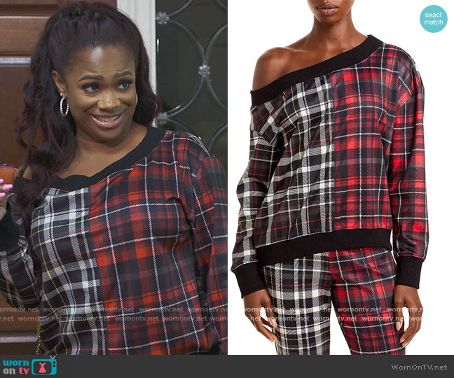 Alice + Olivia Natalie Off-The-ShoulderPlaid Sweatshirt worn by Kandi Burruss on The Real Housewives of Atlanta