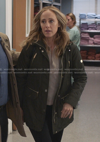 Teddy’s beige collared sweater and green field jacket on Greys Anatomy