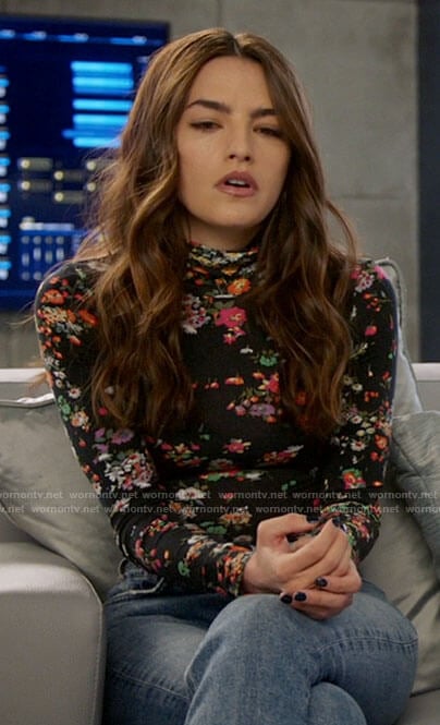 Allegra’s black floral turtleneck top on The Flash