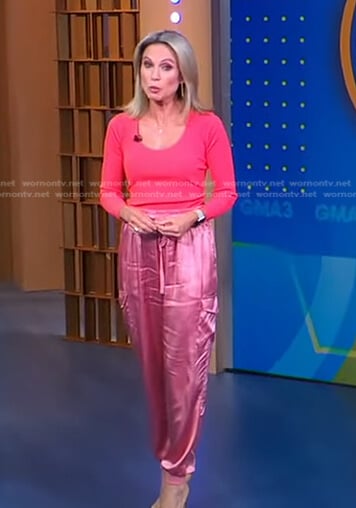 Amy’s orange scoop neck top and pink satin pants on Good Morning America