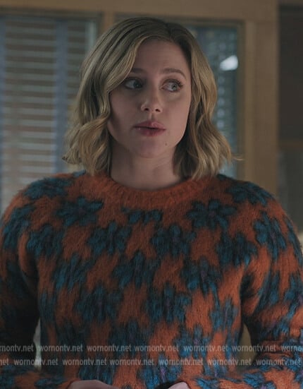 Betty’s orange floral fuzzy sweater on Riverdale