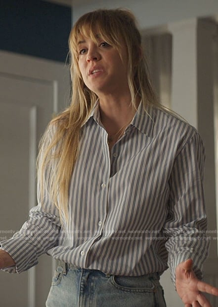 Cassie’s striped button down shirt and wide leg jeans on The Flight Attendant