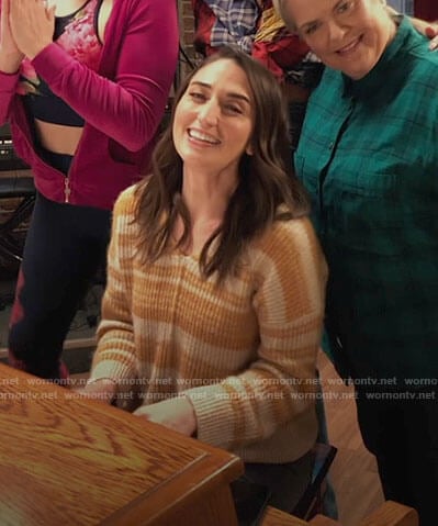 Dawn’s yellow striped v-neck sweater on Girls5eva