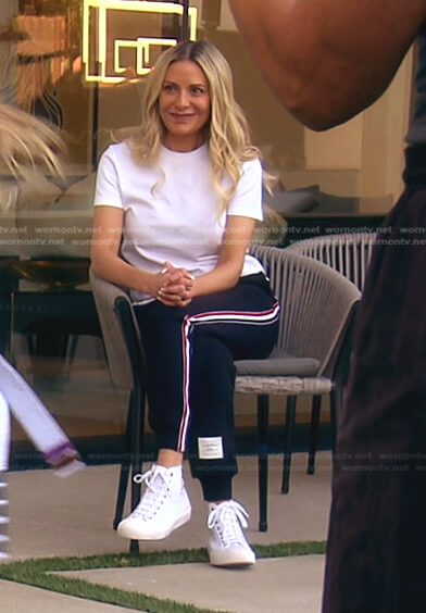Dorit’s white tee and navy track pants on The Real Housewives of Beverly Hills