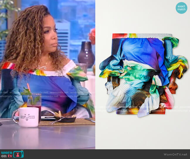 Dries Van Noten Off-the-shoulder smocked printed cotton blouse worn by Sunny Hostin on The View