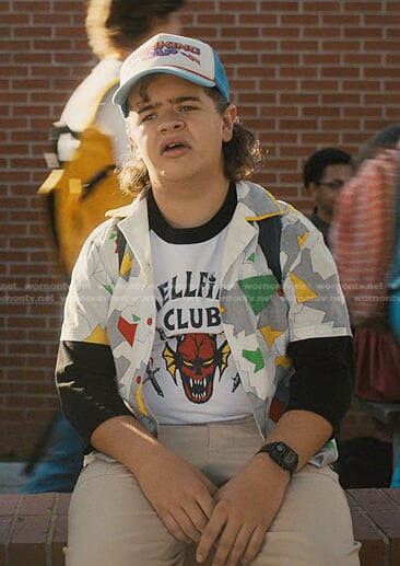 Dustin’s Hellfire Club tee and geometric print shirt on Stranger Things