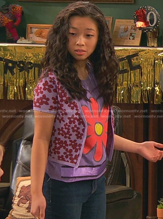 Ivy’s purple floral short sleeve sweater on Ravens Home