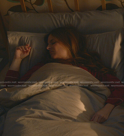 Izzy’s red pajama shirt with white piping on Bull