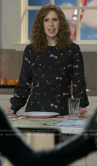Joanna’s black shooting star print dress on I Love That For You
