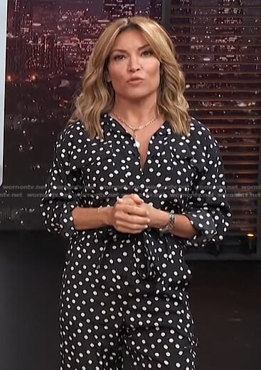 Kit’s black polka dot jumpsuit on Access Hollywood