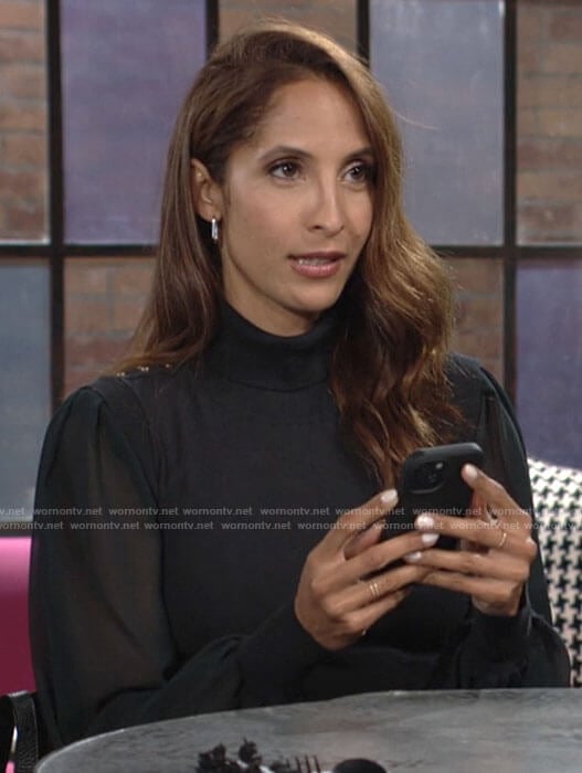 Lily’s black turtleneck sweater with sheer sleeves on The Young and the Restless